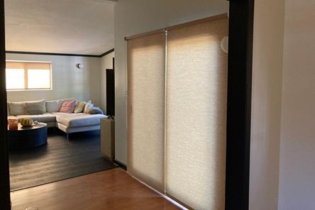 Modern Campbell living room with high quality window shades on the patio sliding door, creating a bright, inviting, and functional space.