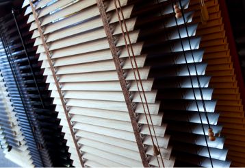 Cordless mini blinds providing modern and safe window solutions in a home environment.