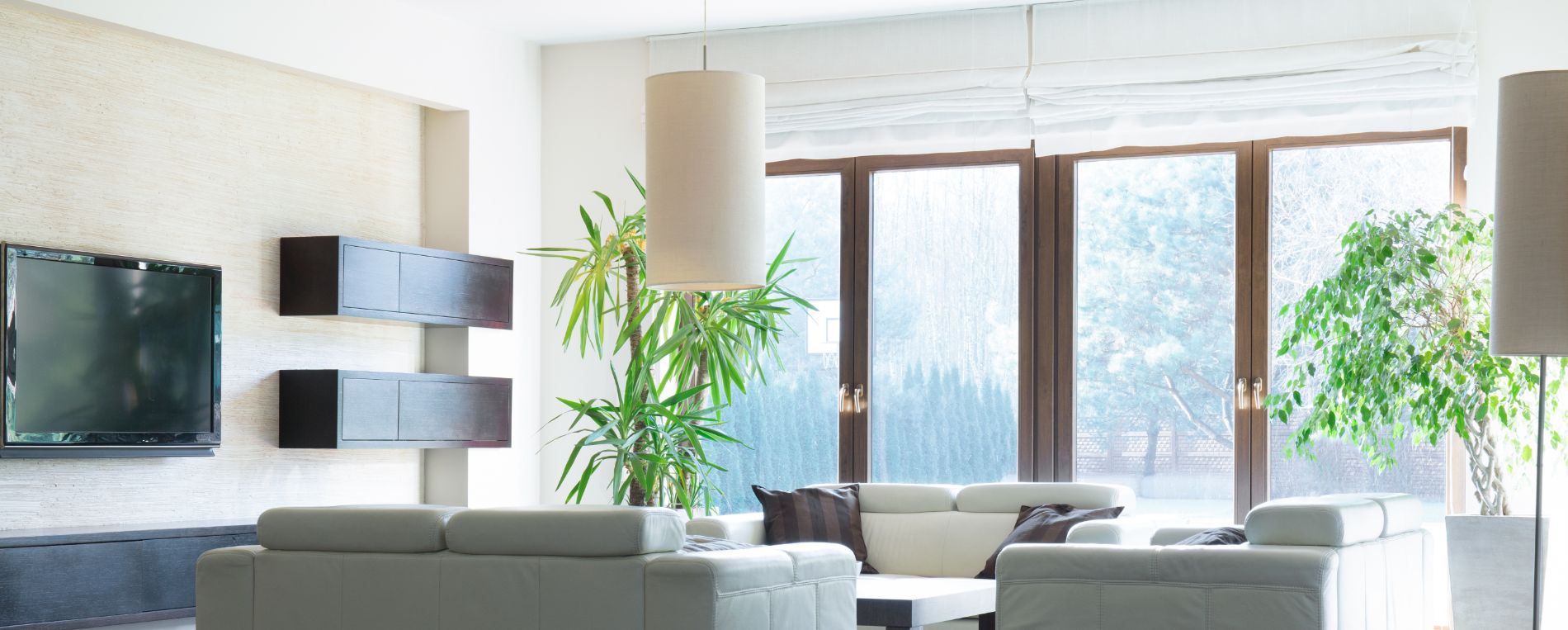 Spacious living room with Roman window shades